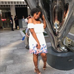 White “As U Wish” off the shoulder dress.